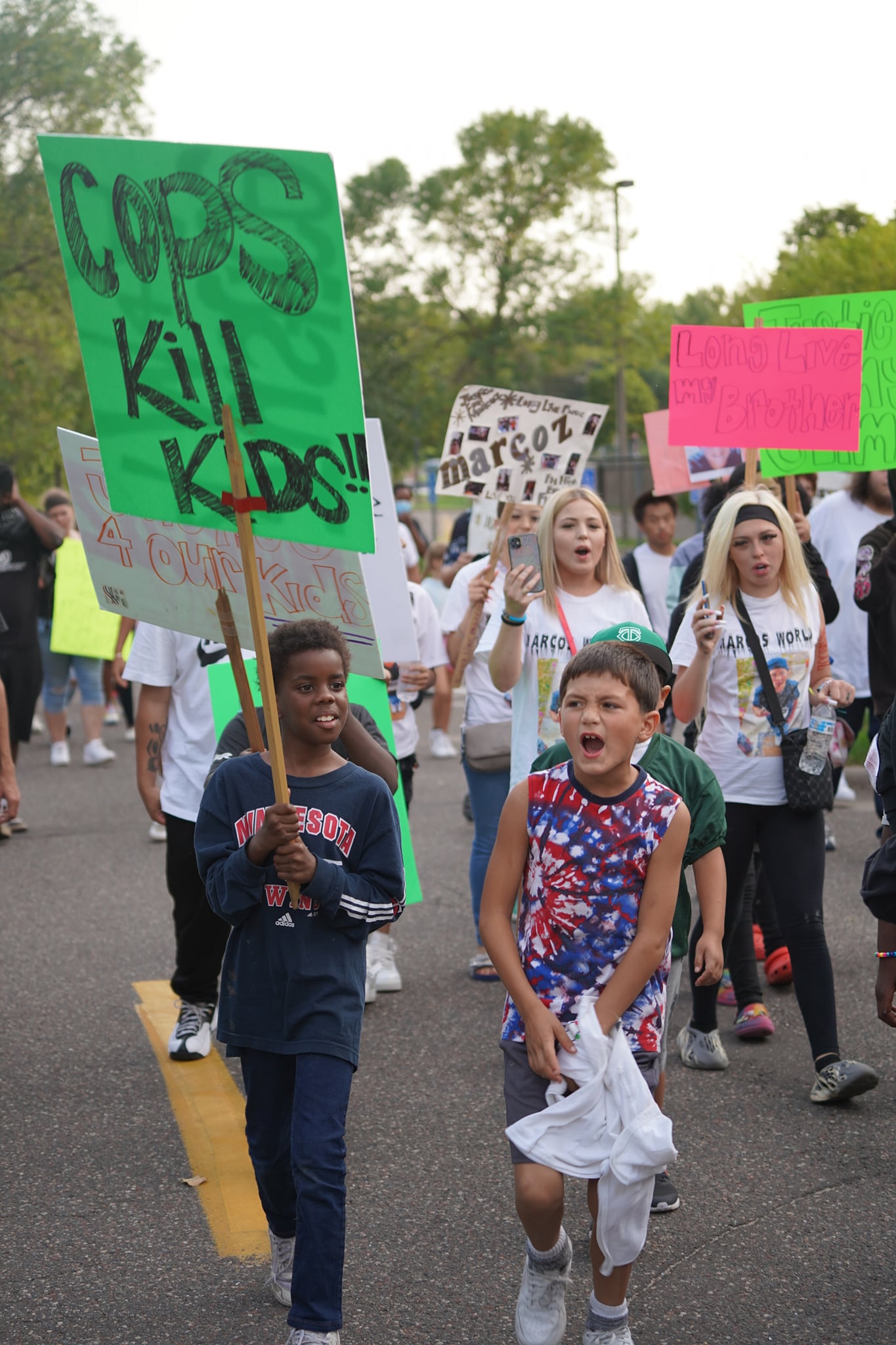 Children March for Teens Killed in Police Chase
